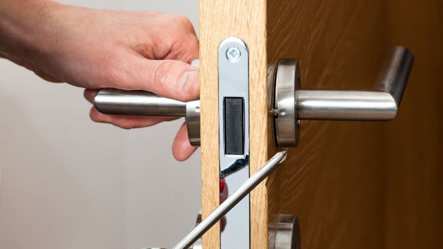 Emergency Locksmith providing fast assistance for a locked door with secure entry methods
