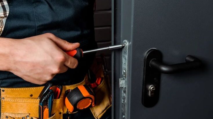 Emergency Locksmith Needham MA helping a local business owner regain access to a commercial storefront.